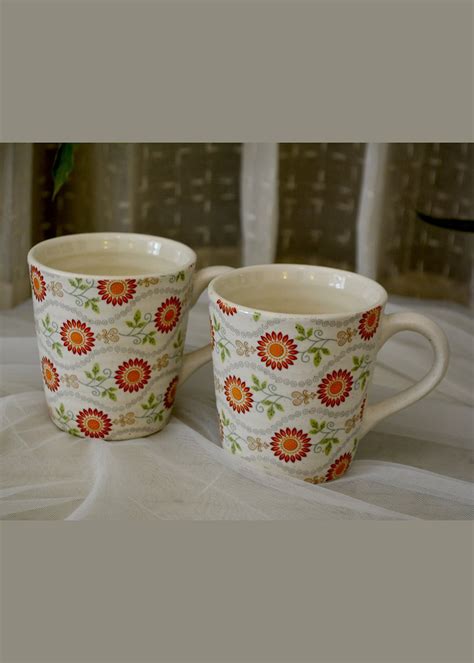 Get Orange Flower Stoneware Mugs (Set of 2) at ₹ 499 | LBB Shop