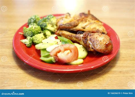 Baked chicken with sides stock image. Image of dish, salad - 16626619