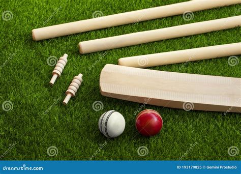 Cricket Bat Ball Stumps and Bails Placed on Green Grass Cricket Pitch ...