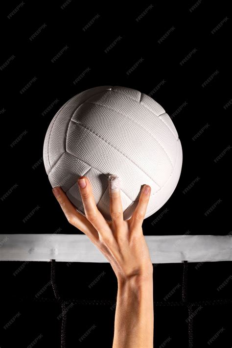 Free Photo | Hand holding volley ball