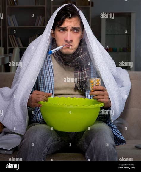 The sick man doing inhalation at night in home Stock Photo - Alamy