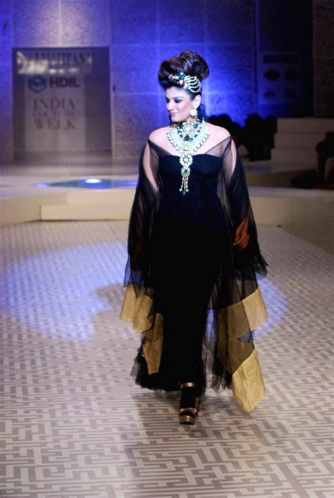 Raveena Tandon walks for Queenie Show.