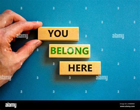You belong here symbol. Concept words You belong here on beautiful blue ...