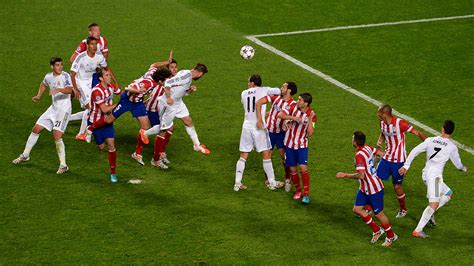 https://library.sportingnews.com/2021-08/sergio-ramos-real-madrid-atletico-champions-league-final-2014_c61od5y9egbu10qcb6svvmkzk.jpg