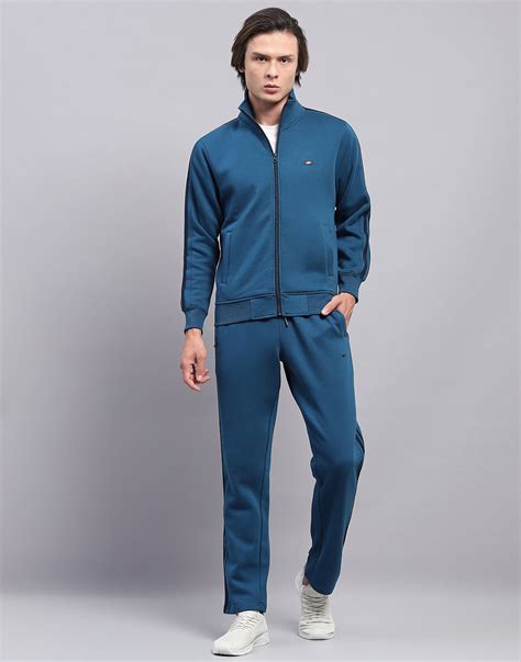 Buy Men Blue Solid Mock Neck Full Sleeve Winter Tracksuit Online in ...