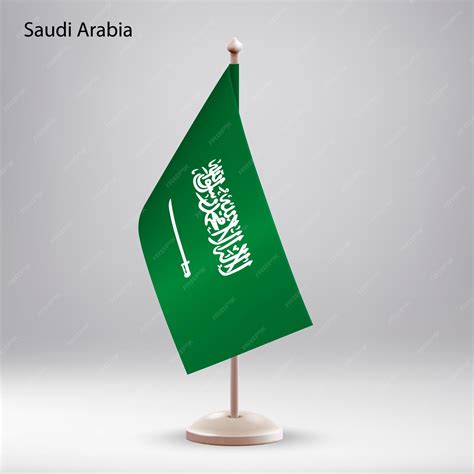 Flag of saudi arabia hanging on a flag stand | Premium Vector