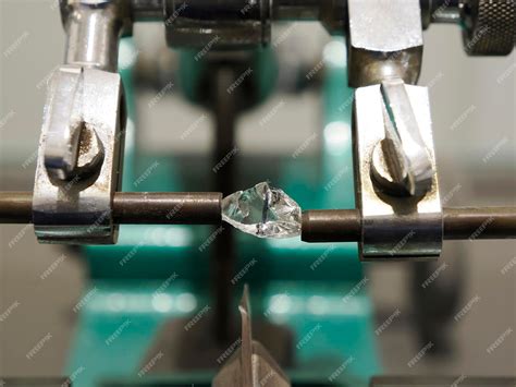 Premium Photo | A diamond cutting machine close up detail