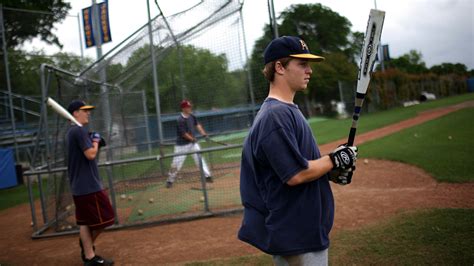 Swing And A Hitch: New Bats Safer, But Power Wanes : NPR