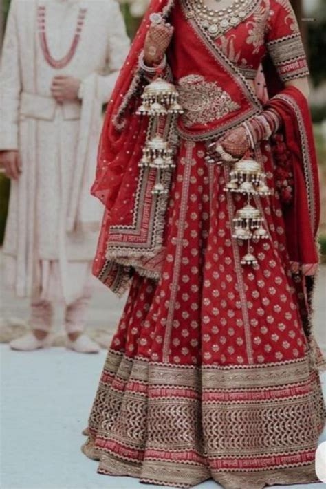 Sabyasachi Red embroidered bridal lehenga – Kuro Clothing India