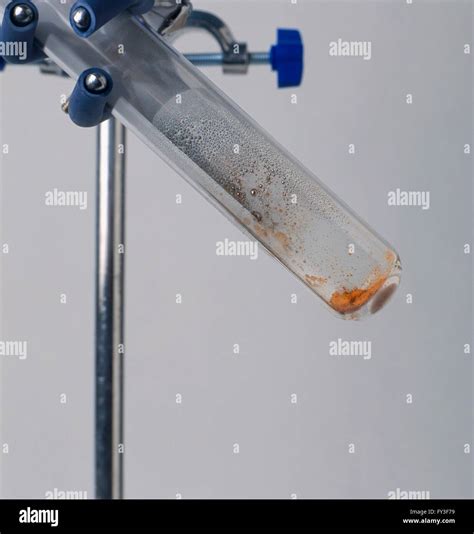 Test tube experiment, Mercury (II) Oxide separated into its constituent ...