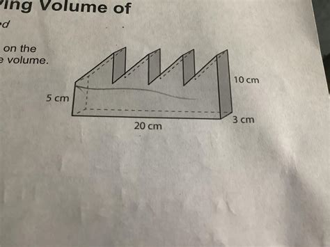 A metal piece has four ridges of equal size on the top. The width of ...