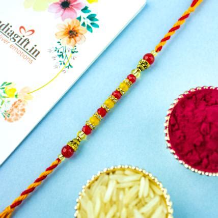 Pearl Rakhi | Buy and Send Pearl Rakhi Online for your Brother in India