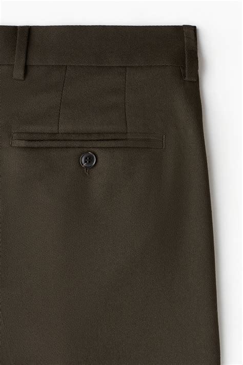 Loose Fit Suit trousers - Dark khaki green - Men | H&M IN