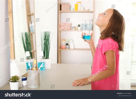 Kids Using Mouthwash