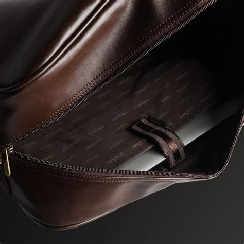 The Clownfish Reagan 28 litres Unisex Faux Leather 15.6 inch Laptop Tr