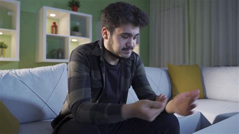 Unhappy and hopeless young man crying, getting angry, bursting with ...