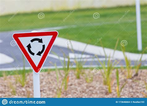 Image result for Red Triangle Roundabout Sign