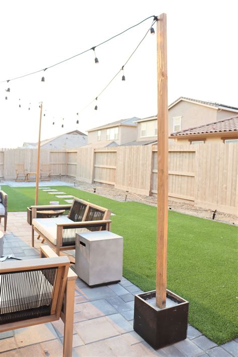 DIY String Light Posts for a Cozy Backyard Patio
