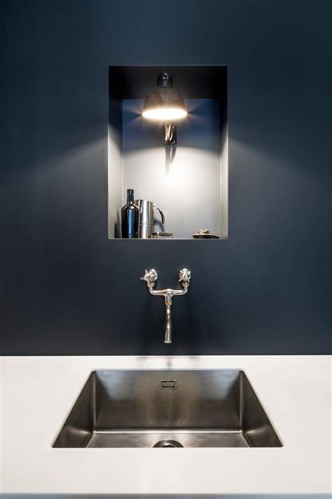 Exposed Plaster Becomes the Hero of This Flat's Design