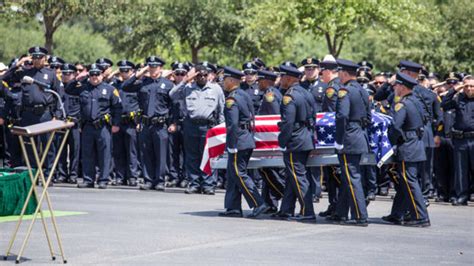WATCH: Governor, mayor, family, friends pay respects to slain SAPD ...