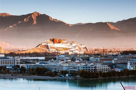- Lhasa city at sunrise with Potala palace, Tibet | Royalty Free Image