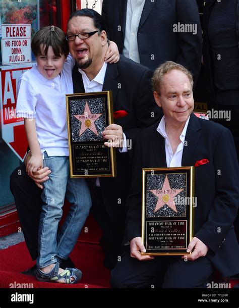 Penn Jillette (C) and Raymond Teller of the comedy/magic duo Penn ...