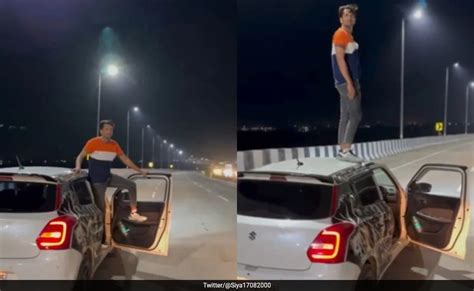 मुंबई पुलिस को चुनौती देते हुए चलती कार पर स्टंटबाजी करता नजर आया शख्स ...