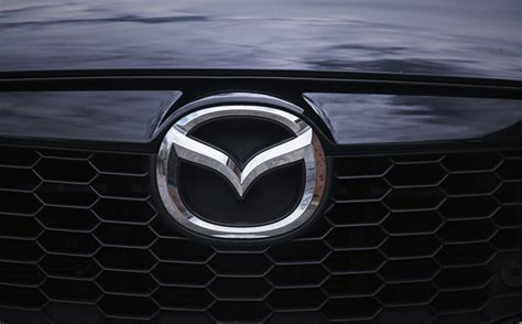 Mazda Logo: Meaning, History, Design Influences, and Evolution - Boon ...