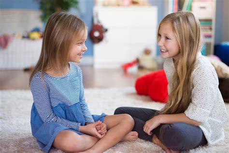 Two kids talking Images - Free Download on Freepik