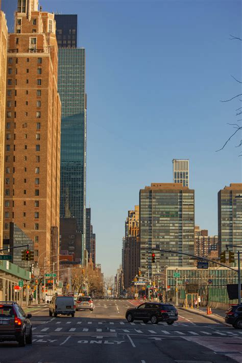 A city street filled with lots of tall buildings photo – Free City ...