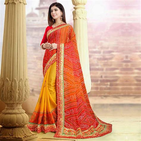 Eye-catching Yellow-Red Colored Festive Wear Zari Work Moss Chiffon ...