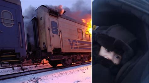 WATCH | Ukrainian soldier rescues woman with baby from burning ...