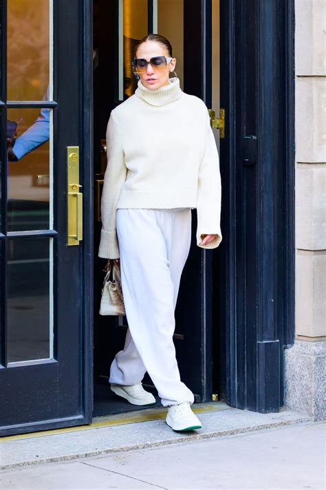 Jennifer Lopez in a White Turtleneck Sweater and White Sweatpants in ...
