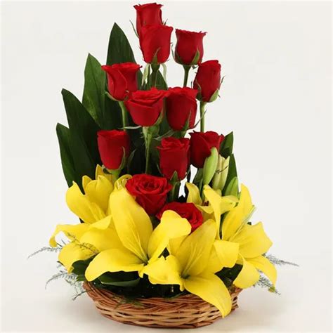 Basket Arrangement Of Lilies And Roses