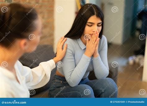 Female Psychologist Calming Sad Spanish Lady, Doctor Consulting Patient ...