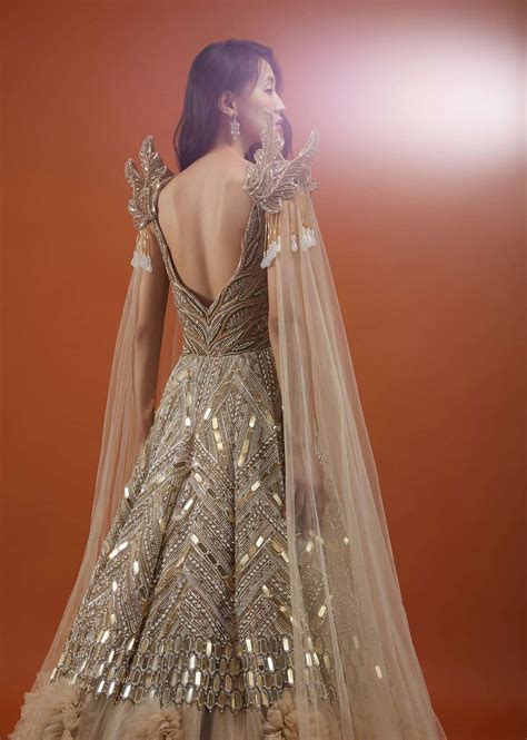 Buy Champagne Gold Divine Net Fabricated Gown With Ruffle Frill ...