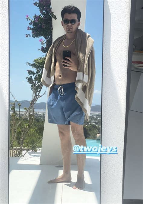 Asa Butterfield's feet