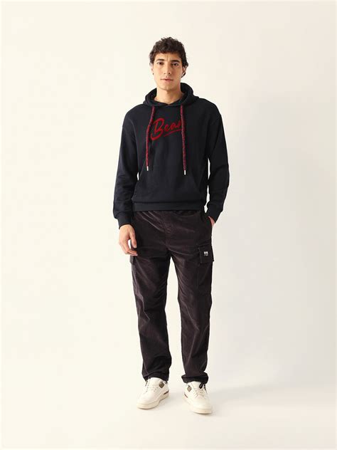 Shop Black Relaxed Fit Hoodie with Bold BEAR Typography Graphic Online ...