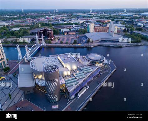 Aerial view of Lowry Centre and Imperial War Museum at dusk, Salford ...