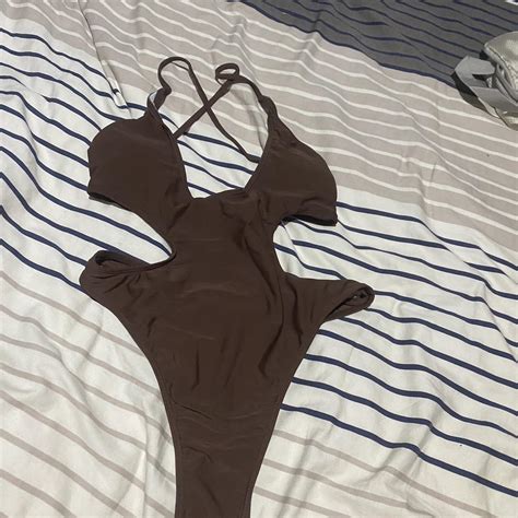 Brown one piece swimsuit Similar to white fox... - Depop