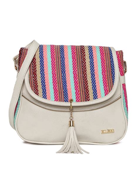 Get Patterned Striped Flap Detail Solid Tasseled Cross-Body at ₹ 1494 ...