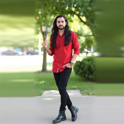 a Beautiful 24 year old Man medium long black hair red shirt black ...