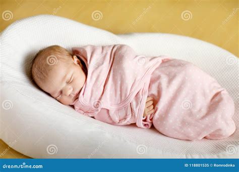 One Week Old Newborn Baby Girl Sleeping Wrapped in Blanket Stock Image ...