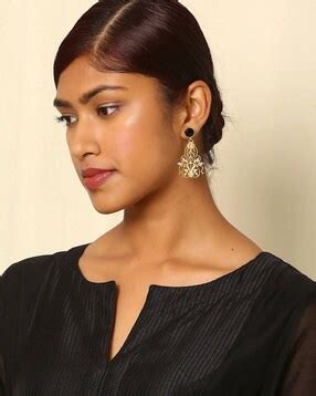 Shop earrings & ear cuffs online. Pick stylish earring designs at Ajio.com
