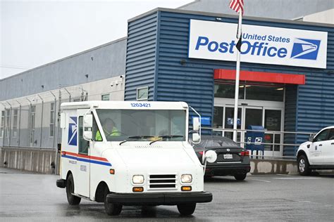 US Postal Service Plans to Cut 10,000 Jobs: What to Know - Newsweek