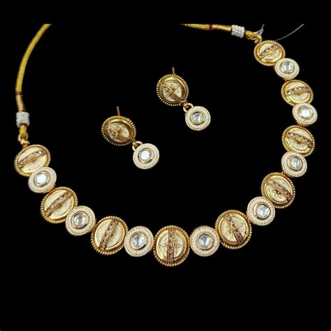 NAFJ Gold Plated Pota Stone And Pearls Meenakari Necklace Set ...