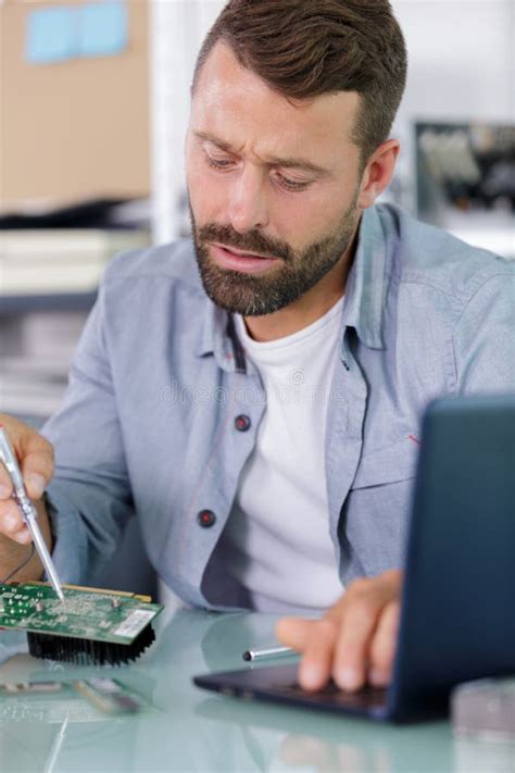 Image result for Man Repairing Computer
