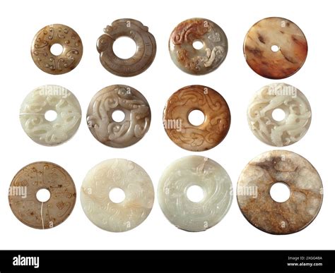 A collection of twelve Chinese bi discs, 10th - 17th century Varying ...