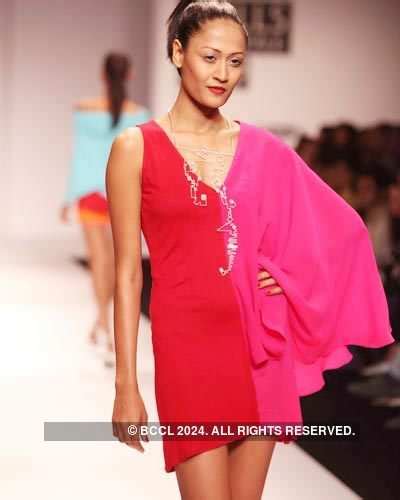 A model presents a creation by designer Wendell Rodricks on Day 1 of ...