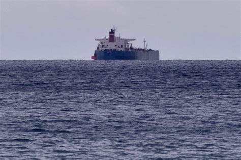 Oil tanker pursued by US now has a Russian flag painted on its side